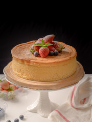 Happy birthday fresh fruit cheese cake with Happy birthday on cake concept with strawberry kiwi fruit cake. Food concept.