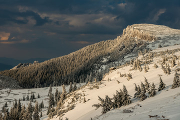the mountain and the snow in a panorama of a winter day