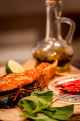 baked fish served with lime and peppers