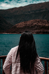 Fototapeta premium Woman looking at the lake