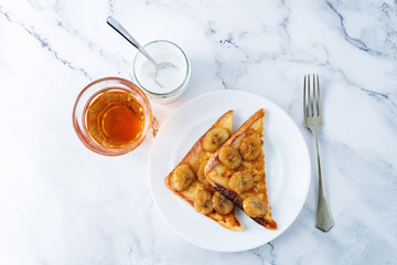 Caramelized banana sweet French Toasts in the plate