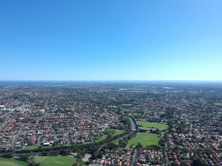 Drone panoramic aerial view of Sydney NSW Australia city Skyline and looking down on all suburbs 