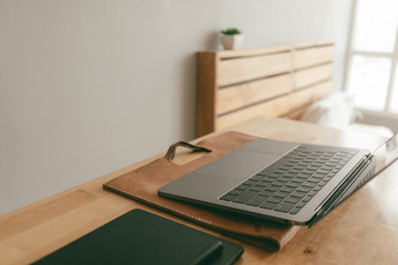 Work from home minimal creative items set of a laptop and pen tablet in the apartment.