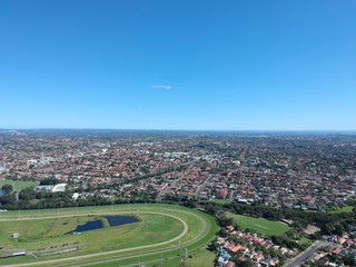 Drone panoramic aerial view of Sydney NSW Australia city Skyline and looking down on all suburbs 