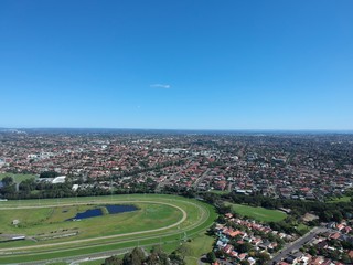 Fototapeta na wymiar Drone panoramic aerial view of Sydney NSW Australia city Skyline and looking down on all suburbs 