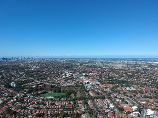 Drone panoramic aerial view of Sydney NSW Australia city Skyline and looking down on all suburbs 