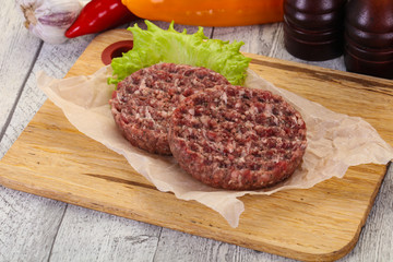 Raw burger cutlet