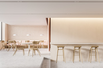 Beige pub interior with counter and sofa