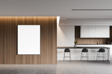 White and wooden kitchen with bar and poster