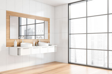 Double sink in wooden and white bathroom corner