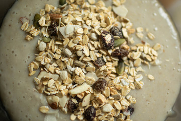 Oatmeal and oatmeal in a plate on the table.