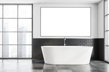 Fototapeta na wymiar White and gray bathroom with tub and poster