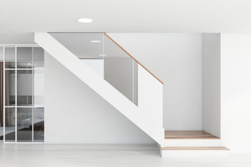 Stairs in white living room interior