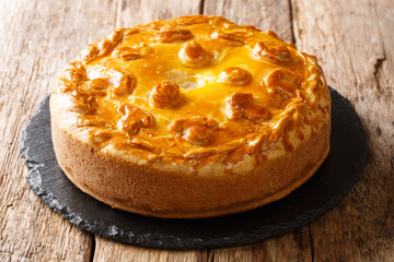 Snack juicy pie Kurnik with chicken, potatoes and onions close up on a slate board. horizontal © FomaA