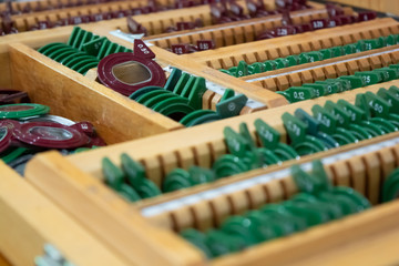 Naklejka premium Close up of old-fashioned ophthalmologist lens rack