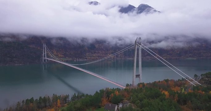 Aerial view of the Hardanger Bridge - a 1400-meter long suspension bridge across the Eidfjorden branch off of the main Hardangerfjorden in Vestland county, Norway.