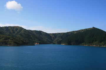 Fototapeta na wymiar lake in the mountains with blue sky