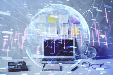 Double exposure of forex graph and work space with computer. Concept of international online trading.