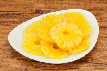 Marinated pineapple rings in the bowl