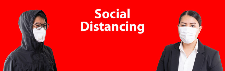 Asian people wearing mask standing distance of 2 meter from other people. protect from COVID-19 viruses pandemic.