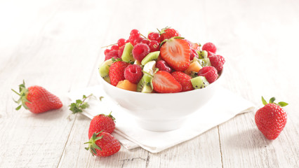 fresh fruit salad with berry fruit, banana, kiwi