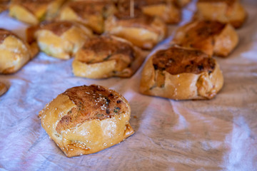 Cypriot easter cheese pastries called flaounes ready to be cooked.