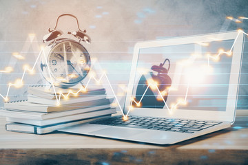 Forex market graph hologram and personal computer on background. Multi exposure. Concept of investment.