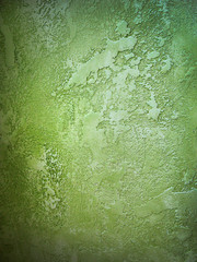Green, juicy decorative stucco background