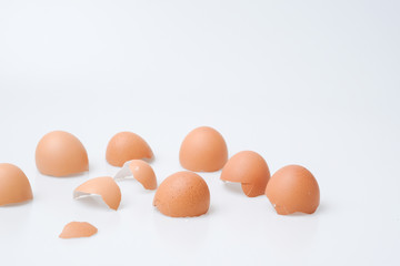 Broken egg shell on white background