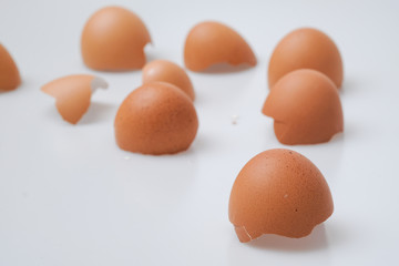 Broken egg shell on white background