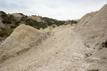 Calanchi of Aliano (Matera). The park of the Aliano gullies, clay sculpture caused by rainwater eroded the surface. The badlands of Basilicata, a lunar landscape in South Italy