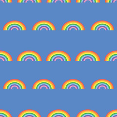 Seamless pattern with colourful rainbows on blue background. Creative texture for fabric, wrapping, textile, backgrounds, wallpaper, apparel. Vector illustration