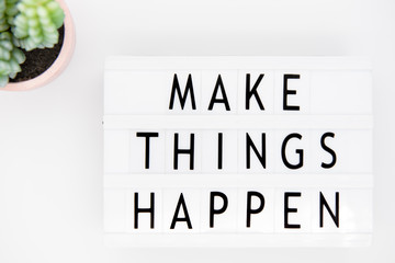 An inspirational motivating quote "Make things happen"