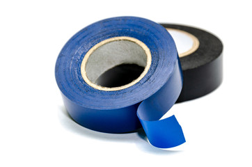 Two reels of electrical tape on a white background. Isolated object. The tool for work with electric wires. A means for protection against electric shock.
