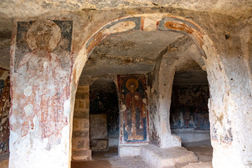 The frescoes of the rock church of Santa Margherita and cave dwellings in Mottola, Taranto, Apulia...