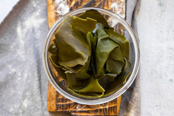 Kombu or laminaria leaves -  Japanese or Chinese seaweed salad. © Viktor Kochetkov