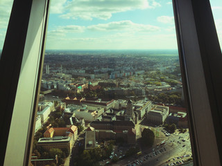 Fototapeta na wymiar High Angle View Of City Buildings Seen Through Window