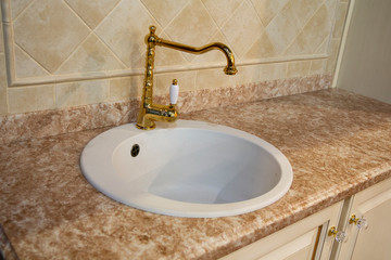 Elegant sink in retro style in the bathroom. interior