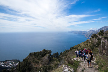 Positano, Campania, Italy - march 2 2017: Hikers walk on a Beautiful path of Amalfi coast called the Path of the Gods (Sentiero degli Dei) Trekking route from Agerola to Nocelle.