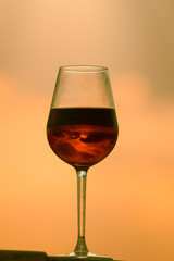 Clouds Reflection in a glass of red wine