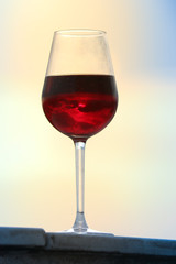 Clouds Reflection in a glass of red wine