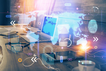 Multi exposure of table with computer and world map hologram. International data network concept.