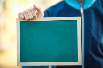 a Coronavirus Outbreak of the corona virus. Epidemic Viral Respiratory Syndrome. Plate in Man's Hands China