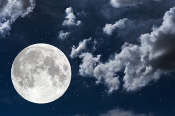 Fototapeta na wymiar Full moon and white cloud on the sky.