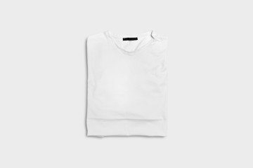 Folded T-Shirt Mock-up In white Color was made to make your logo or graphic design.High-resolution photo.