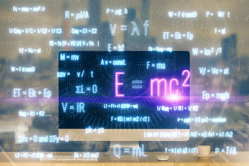Desktop computer background and formula hologram writing. Double exposure. Education concept.