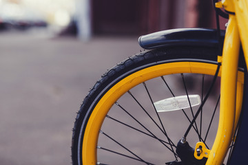 Fototapeta na wymiar Bicycle wheel close-up. Detail bike. copy space