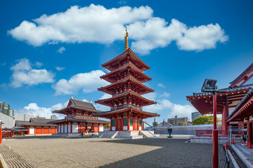 Shitennoji is one of the oldest Buddhist temple in Osaka, The five story pagoda and blue sky background at Shitennoji Temple, The oldest ancient architecture temple in Osaka, Japan. - obrazy, fototapety, plakaty