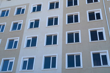 facade of a new multi-storey building with many windows
