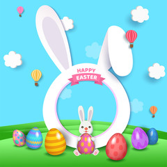 Happy Easter with rabbit frame and painted eggs on nature background.